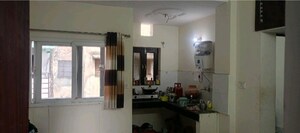 Kitchen in 1 BHK Apartment at GNDA Flats, Zeta I Greater Noida – for Rent