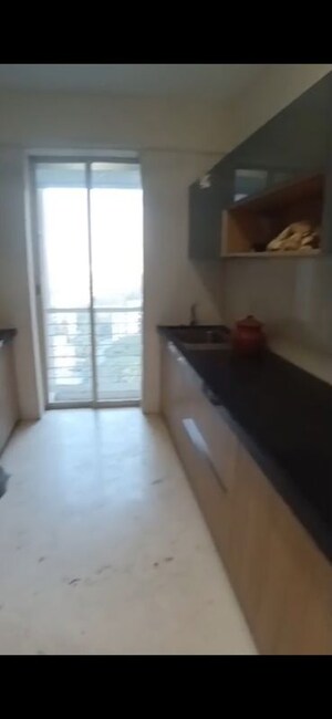 Kitchen in 2.5 BHK Apartment at Ekta Tripolis, Goregaon West – for Rent