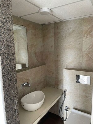 Bathroom in 2 BHK Apartment at Ruparel Ariana, Parel – for Rent