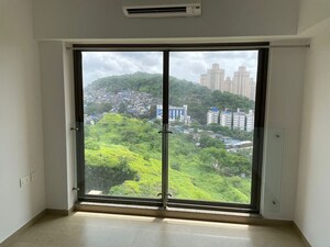 Room in 2 BHK Apartment at Ruparel Ariana, Parel – for Rent