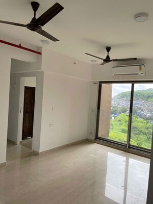 Room in 2 BHK Apartment at Ruparel Ariana, Parel – for Rent