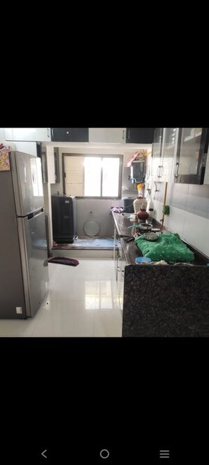 Kitchen in 2 BHK Apartment at Ashray Platina, New Ranip – for Rent
