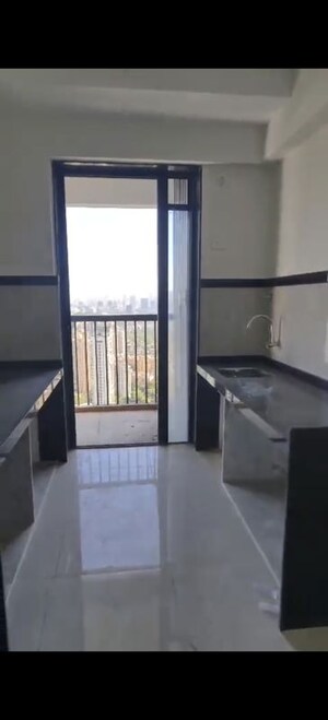 Kitchen in 2 BHK Apartment at Damji Shamji Mahavir Spring Tulip Phase 1, Pokhran Road No Two – for Rent