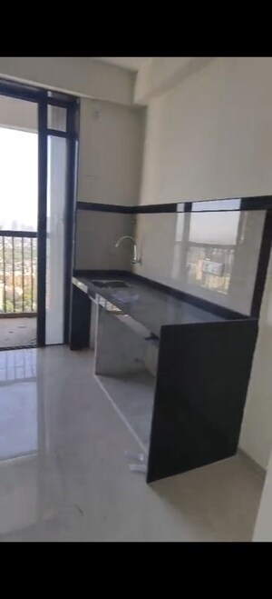 Kitchen in 2 BHK Apartment at Damji Shamji Mahavir Spring Tulip Phase 1, Pokhran Road No Two – for Rent
