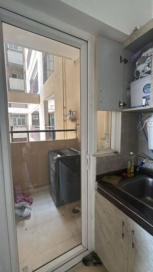 Kitchen in 3 BHK Apartment at Mahagun Moderne, Sector 78 – for Rent
