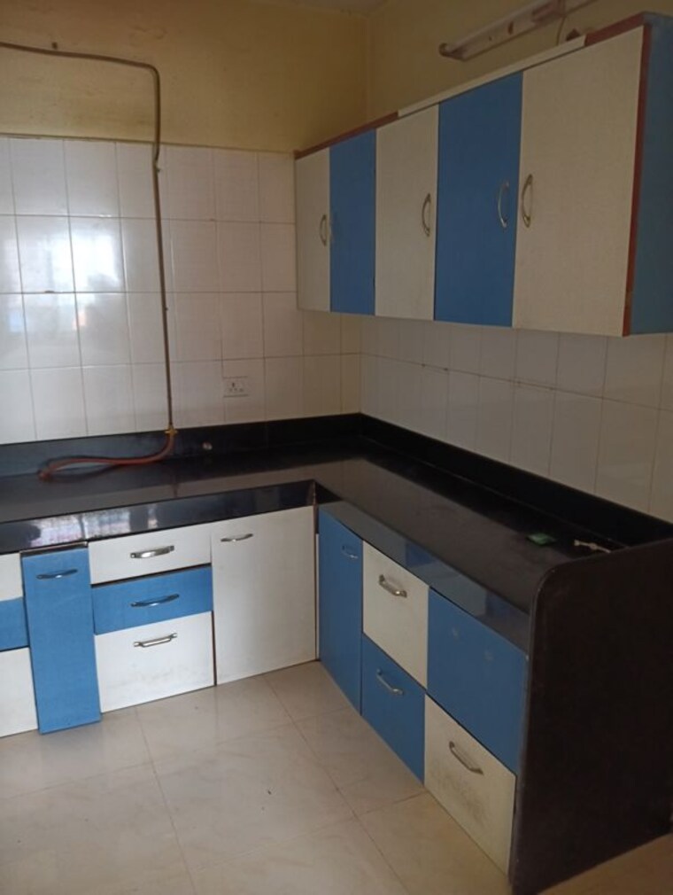 Kitchen, aditya-breeze-park 2 Bedroom 1000 Sq.Ft. Apartment In Balewadi Pune 10444484