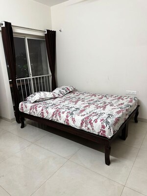 Bedroom in 2 BHK Apartment at Megapolis Serenity, Hinjewadi – for Rent