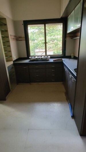 Kitchen in 3 BHK Apartment at Amrapali CHS Andheri, Andheri East – for Rent