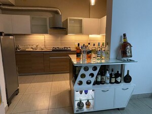 Kitchen in 4 BHK Apartment at ABA Cleo County, Sector 121 – for Rent