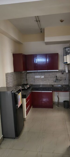 Kitchen in 2.5 BHK Apartment at Nimbus The Golden Palm, Sector 168 – for Rent