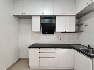 Kitchen in  Apartment at Bhartiya Nikoo Homes Phase 2, Thanisandra Main Road – for Rent