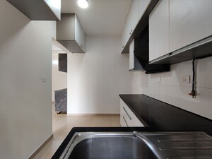 Kitchen in  Apartment at Bhartiya Nikoo Homes Phase 2, Thanisandra Main Road – for Rent