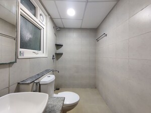 Bathroom in  Apartment at Bhartiya Nikoo Homes Phase 2, Thanisandra Main Road – for Rent