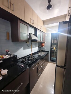 Kitchen in 3 BHK Apartment at Atul Blue Meadows, Andheri East – for Rent