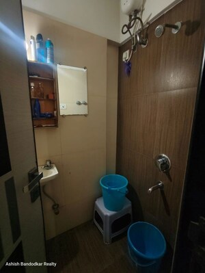 Bathroom in 3 BHK Apartment at Atul Blue Meadows, Andheri East – for Rent