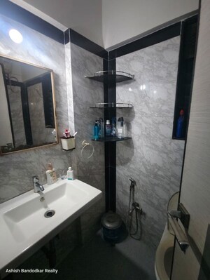 Bathroom in 3 BHK Apartment at Atul Blue Meadows, Andheri East – for Rent