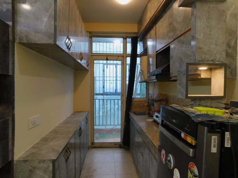 Kitchen, supertech-supernova-spira-residency 1 RK 595 Sq.Ft. Apartment In Sector 94 Noida 10446514