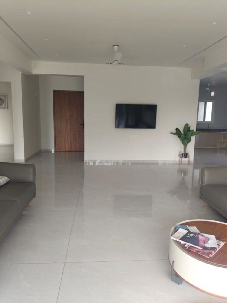 Living Room, swastika-empire 3 Bedroom 1500 Sq.Ft. Apartment In New Alkapuri Vadodara 10446560