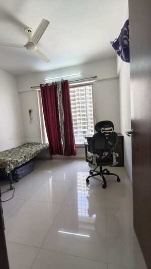 Living Room in 2 BHK Apartment at Millennium Atlas, Tathawade – for Rent