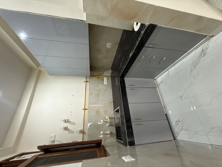 Kitchen, sector 63a 2.5 Bedroom 100 Sq.Ft. Builder Floor In Sector 63a Noida 10446751