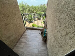 Balcony in 1.5 BHK Apartment at Lodha Lakeshore Greens, Dombivli East – for Rent