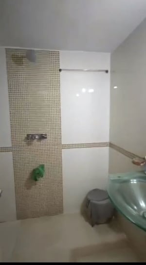 Bathroom in 2 BHK Apartment at Dedhia Palatial Height, Powai – for Rent