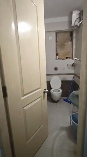 Bathroom in 2 BHK Apartment at Dedhia Palatial Height, Powai – for Rent