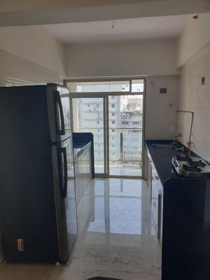 Kitchen in 2 BHK Apartment at Haware Tilak Nagar, Tilak Nagar – for Sale