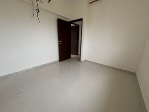 Room in 2 BHK Apartment at Omkar Signet, Malad East – for Sale