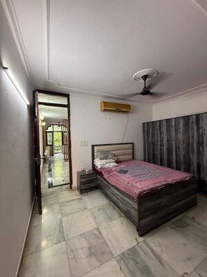 Bedroom in 2 BHK Builder Floor at Kalkaji – for Rent
