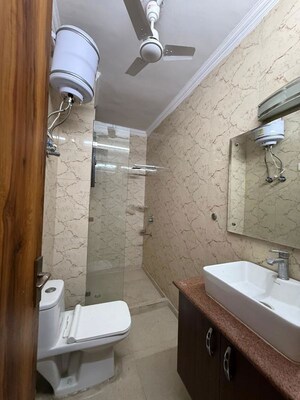 Bathroom in 2 BHK Builder Floor at Kalkaji – for Rent