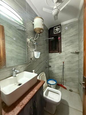Bathroom in 2 BHK Builder Floor at Kalkaji – for Rent
