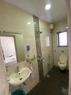 Bathroom in 3 BHK Apartment at Navin Nagar – for Rent