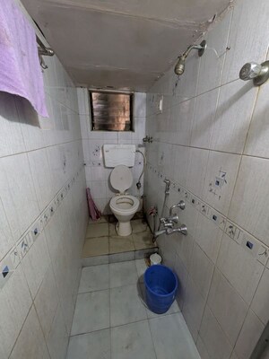 Bathroom in 1 BHK Apartment at Madhav Apartment Borivali, Borivali West – for Rent