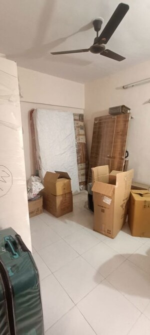 Living Room in 1 BHK Apartment at Ganga Sarovar, Wadgaon Sheri – for Rent