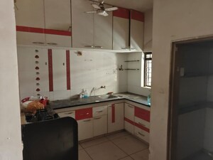 Kitchen in 2 BHK Apartment at Aavkar Abhilash Apartments, Near Nirma University On Sg Highway – for Rent