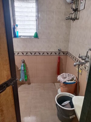 Bathroom in 2 BHK Apartment at Naupada – for Rent