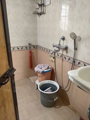Bathroom in 2 BHK Apartment at Naupada – for Rent