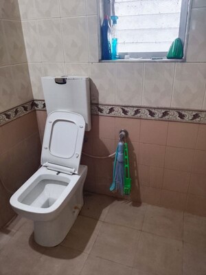 Bathroom in 2 BHK Apartment at Naupada – for Rent