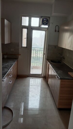 Kitchen in 3 BHK Apartment at ATS Homekraft Pious Hideaways, Sector 150 – for Rent
