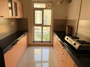Kitchen in 3 BHK Apartment at Godrej Emerald Vista, Ghodbunder Road – for Rent