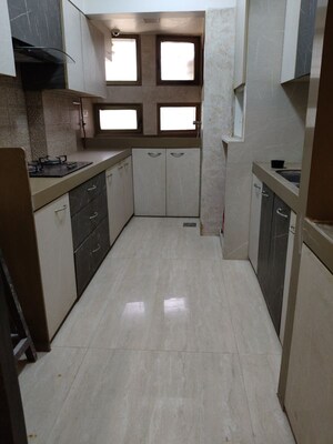 Kitchen in 2 BHK Apartment at Romell Serenity, Oshiwara – for Rent