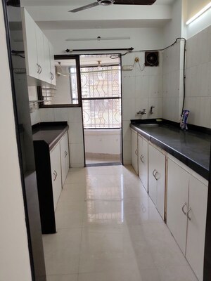 Kitchen in 2 BHK Apartment at Romell Serenity, Oshiwara – for Rent