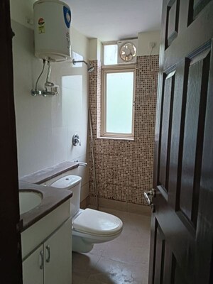 Bathroom in 2 BHK Apartment at Unitech Woodstock Floors, Sector 50 – for Rent