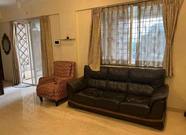 Living Room, gera-song-of-joy 2 Bedroom 1000 Sq.Ft. Apartment In Kharadi Pune 10447389