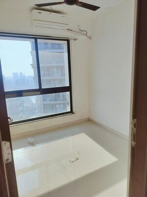 Room in 2 BHK Apartment at Sunteck Avenue 2, Goregaon West – for Rent