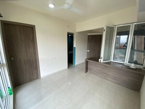 Living Room in 2 BHK Apartment at Lodha Palava Crown, Dombivli East – for Rent