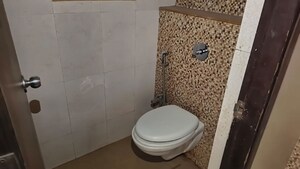 Bathroom in 1 BHK Apartment at Lodha Downtown, Dombivli East – for Rent