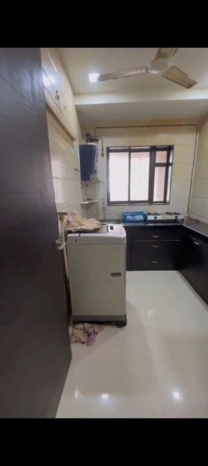 Kitchen in 1 BHK Apartment at Bhavna Apartment Vile Parle West, Vile Parle West – for Rent