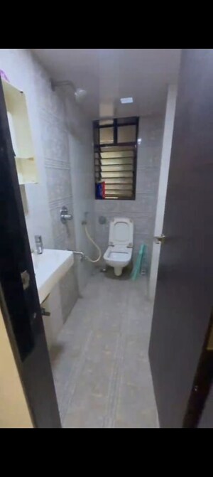 Bathroom in 1 BHK Apartment at Bhavna Apartment Vile Parle West, Vile Parle West – for Rent
